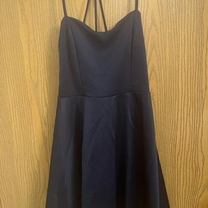 Navy blue knee length dress with cross cross straps